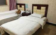 Kamar Tidur 7 Youyi Business Hotel