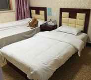 Kamar Tidur 7 Youyi Business Hotel