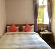 Kamar Tidur 7 Holiday Hotel