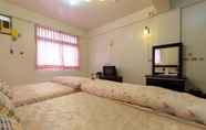 Kamar Tidur 6 Plum Inn 2