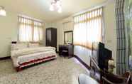 Kamar Tidur 3 Plum Inn 2