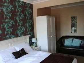 Kamar Tidur 4 The Beverley Inn