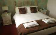 Kamar Tidur 4 The Beverley Inn