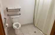 In-room Bathroom 5 Budgetinn & Suites