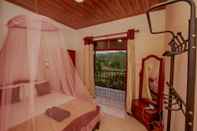 ห้องนอน Ëlla Breeze Homestay