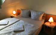 ห้องนอน 4 Hotel Garni Zum Holzfäller