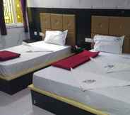 Bilik Tidur 4 Hotel Vel Residency