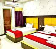 Bedroom 6 Hotel Vel Residency