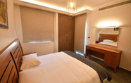 Bedroom 5 Brazilia Suites Hotel