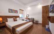 Kamar Tidur 2 B & B Hotel Quan Hoa