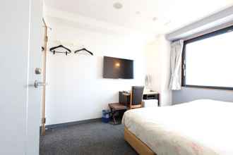 Bedroom 4 Toyama Town Hotel 24