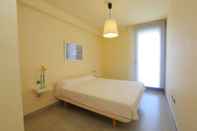 Bilik Tidur Apartamento Junto al mar Para 8 Personas en Cambrils