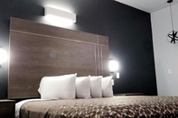 Kamar Tidur Continental Inn & Suites