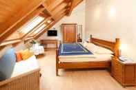 ห้องนอน Gästehaus und Weingut Peth