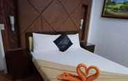 Kamar Tidur 4 Ey Miners Suites Navarro