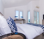 Bedroom 2 Seafront Luxury Apartments Fun