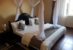 침실 4 Central Inn Hotel Entebbe