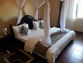 침실 4 Central Inn Hotel Entebbe