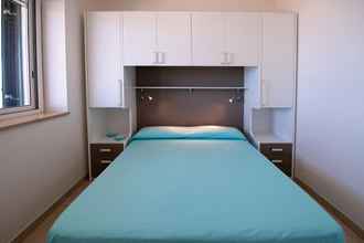 Kamar Tidur 4 Villaggio Azzurra