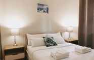 Kamar Tidur 4 Lotus Stay Manly Apartment 29B