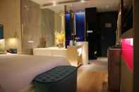 Kamar Tidur R-Kiss Boutique Hotel