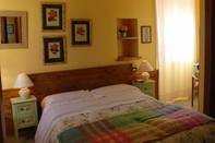 ห้องนอน Bed & Breakfast Il Melograno