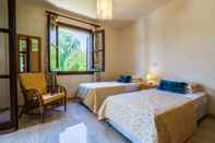 Bedroom 3 bedroom Villa Anarita 64 with private L-shaped pool, beautiful gardens, near resort village square