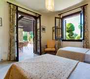 Bedroom 4 3 bedroom Villa Anarita 64 with private L-shaped pool, beautiful gardens, near resort village square