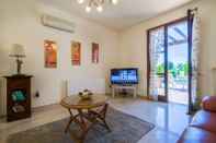 Common Space 3 bedroom Villa Anarita 64 with private L-shaped pool, beautiful gardens, near resort village square