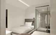 Kamar Tidur 4 Triple Y Hotel