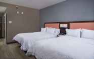 Bedroom 2 Hampton Inn by Hilton Burley