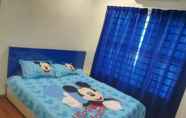 Kamar Tidur 6 Windmill Cartoon at Sunrise Homestay