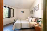 Bedroom Residence Verde Navarrese A