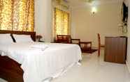 Phòng ngủ 6 Saravana Inn