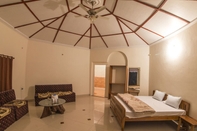 Kamar Tidur WOWSTAYZ Pachmarhi Foothill Cottages