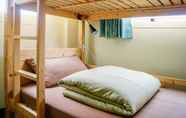 Kamar Tidur 7 Happy Tree Hostel