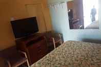 Kamar Tidur Guest Host Motel