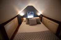 Kamar Tidur Cherry Orchard Lodge