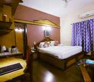 Bedroom 6 Hotel Radhika Regency