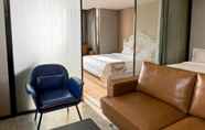 Bedroom 2 Pengman International Apartment Hotel