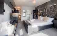 Kamar Tidur 3 TLC Exmouth Bed and Breakfast