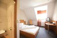 ห้องนอน Neumaiers Hirsch Gasthof & Landhotel