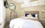 Bedroom 2 The Mayfair Parade - Trendy 1bdr Pied-a-terre in Central London