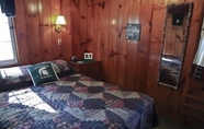 Bedroom 4 #1 - Cedar Village 2 Bedroom Cabin by RedAwning