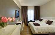 Bedroom 4 Domus Porto Di Traiano Resort