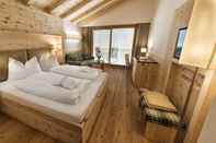 Bedroom Dolomites Nature Hotel Vigilerhof