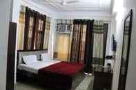 Bedroom Hotel South Delhi Inn