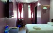 Kamar Tidur 7 Purple Dream Homestay