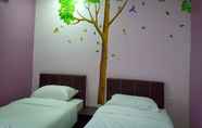 Kamar Tidur 6 Purple Dream Homestay