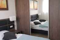Bedroom PRIMA Ferienwohnungen Seetor Residenz